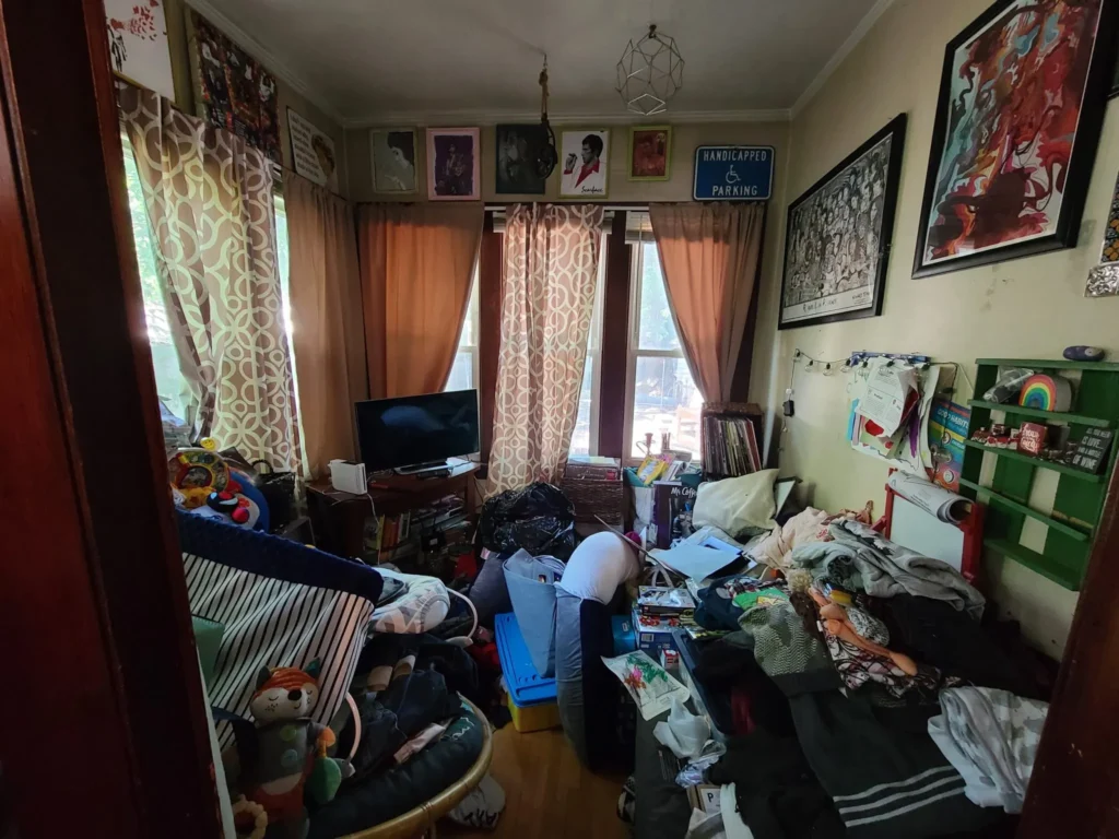 This was a room of everything and was not very bright or useful for my client and her family. 