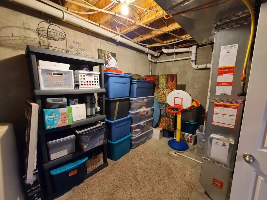 The storage room has a path to walk and the items are readily available to the owners.
